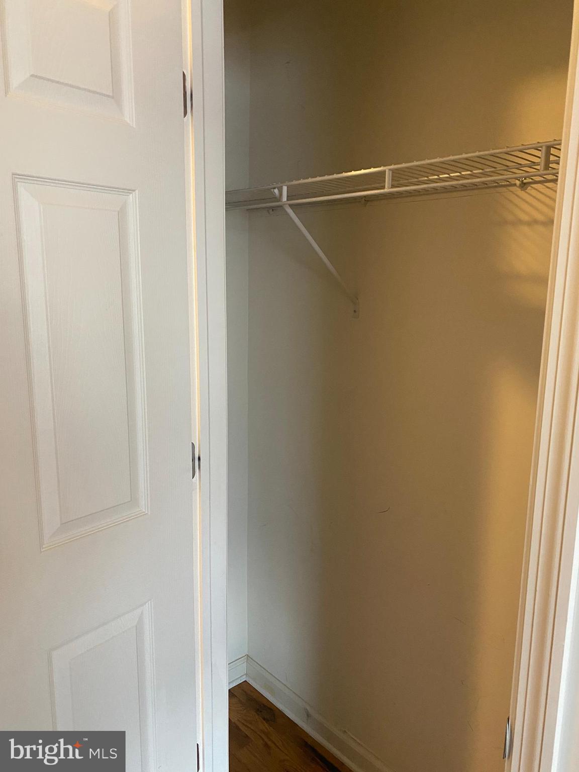 58 South Broadway, Unit 58C Pitman, NJ 08071 - Photo 27 of 35 a view of a room with racks on the wall