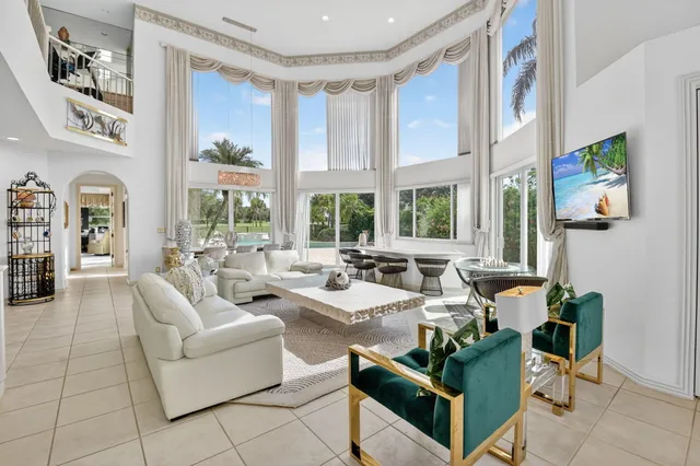 a kitchen with stainless steel appliances a refrigerator sink and cabinets