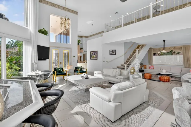 a kitchen with cabinets and window
