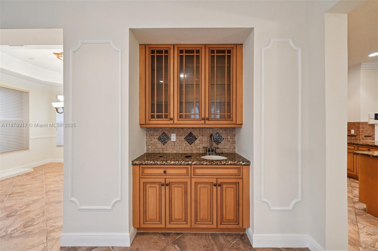 9192 Nugent Trail West Palm Beach, FL 33411 - Photo 17 of 62 a bathroom with a sink and a mirror