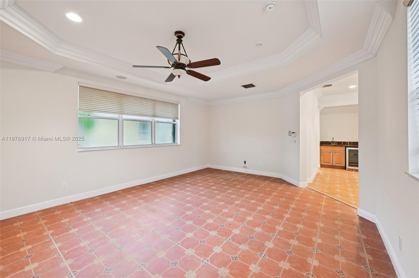 9192 Nugent Trail West Palm Beach, FL 33411 - Photo 21 of 62 a view of a livingroom with a ceiling fan and window