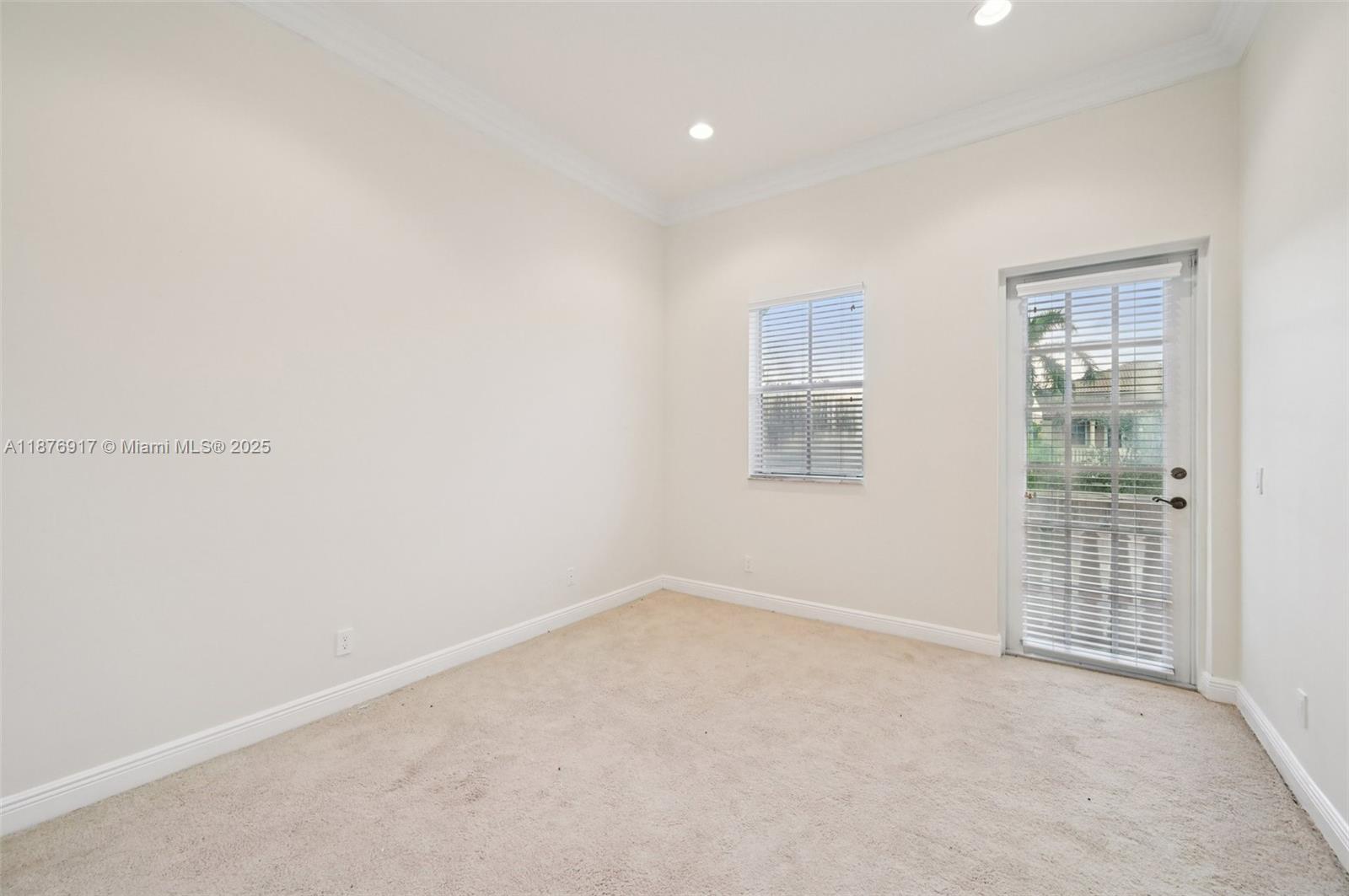 9192 Nugent Trail West Palm Beach, FL 33411 - Photo 29 of 62 an empty room with windows