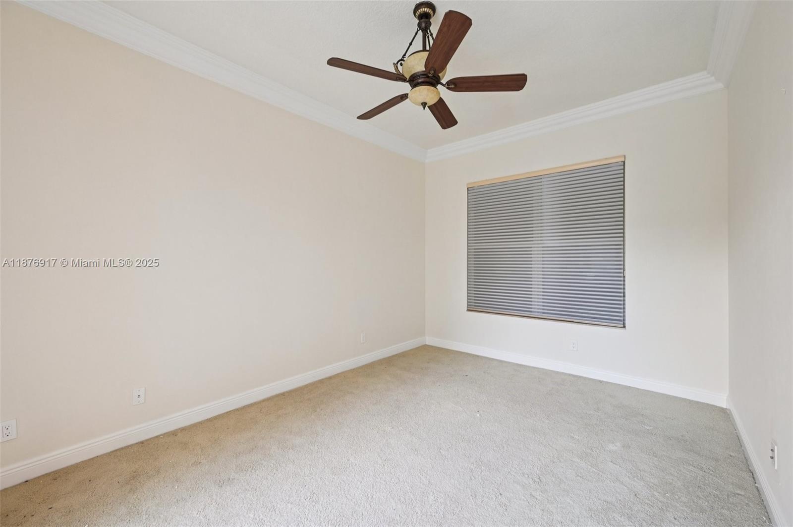 9192 Nugent Trail West Palm Beach, FL 33411 - Photo 39 of 62 a view of room with a ceiling fan and window