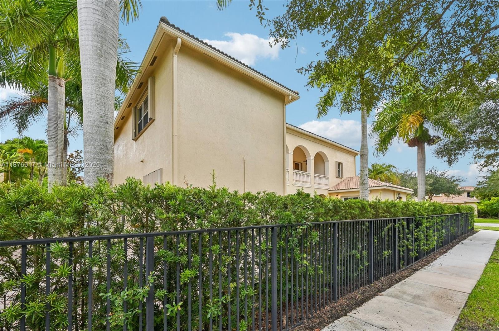 9192 Nugent Trail West Palm Beach, FL 33411 - Photo 48 of 62 a view of a house with a yard