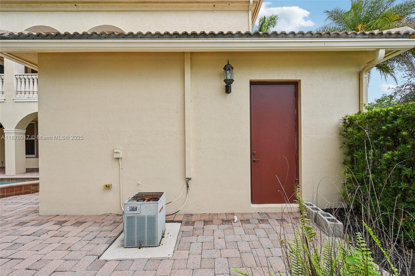 9192 Nugent Trail West Palm Beach, FL 33411 - Photo 49 of 62 a view of a entryway door of the building