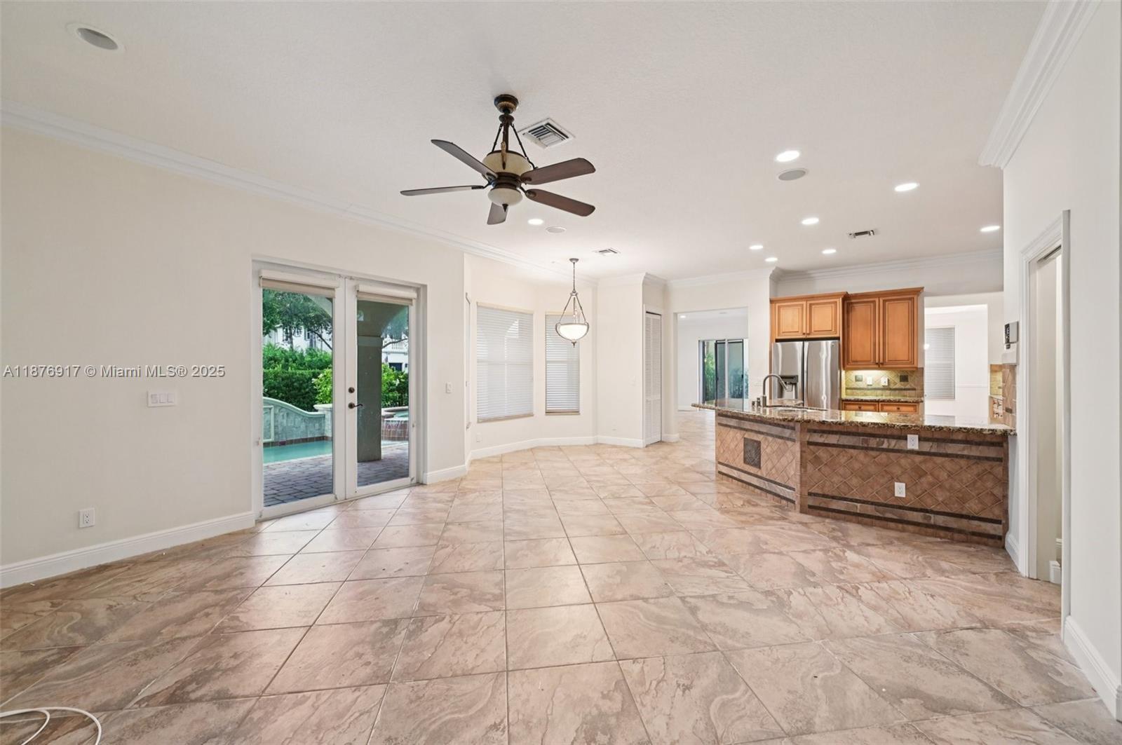 9192 Nugent Trail West Palm Beach, FL 33411 - Photo 5 of 62 a large space with a large window and a kitchen view