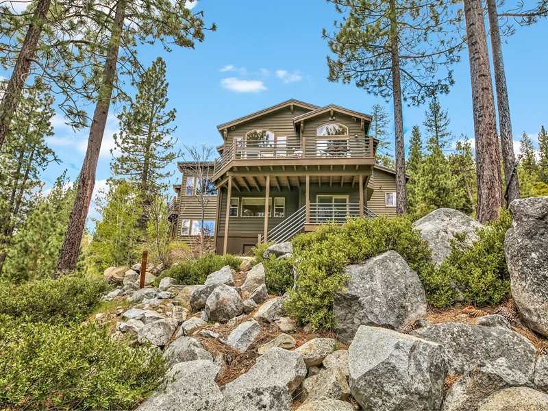 16313 Cinnamon Ridge Place Truckee, CA 96161 - Photo 2 of 10 a front view of a house with a garden