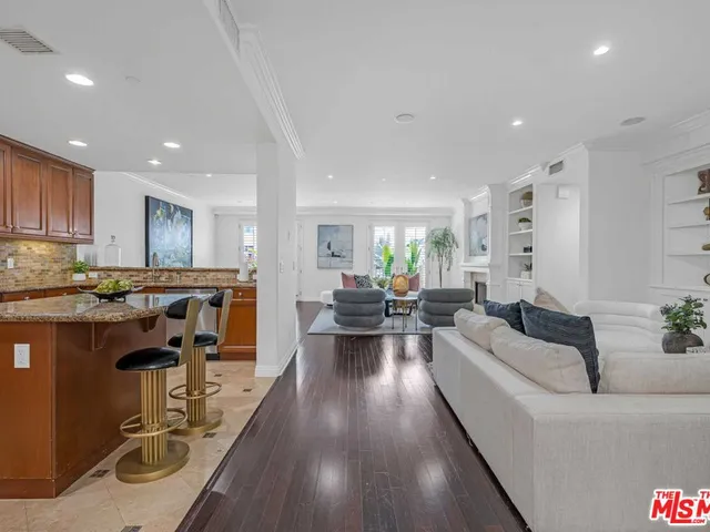 a living room with furniture and decor