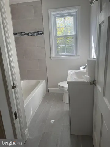 a close view of a bathtub in bathroom