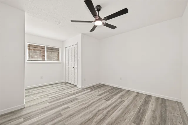 a view of backyard with green space