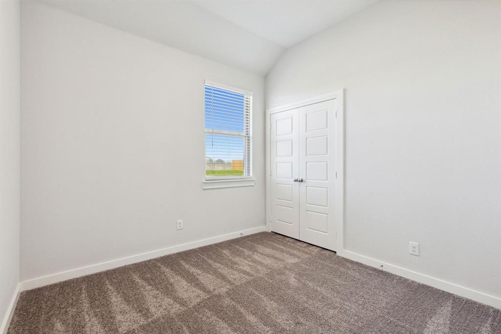 108 Millwood Road Lavon, TX 75166 - Photo 12 of 22 an empty room with windows