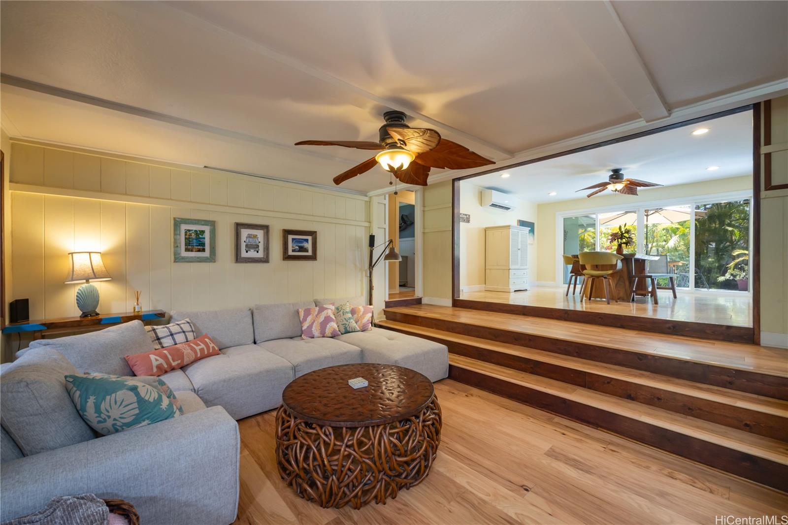 409 Wanaao Road Kailua, HI 96734 - Photo 5 of 25 a living room with furniture and a chandelier