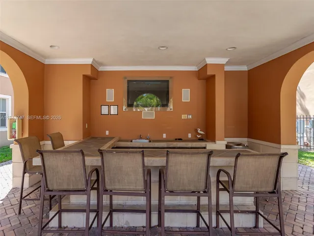 a view of outdoor space with swimming pool and porch