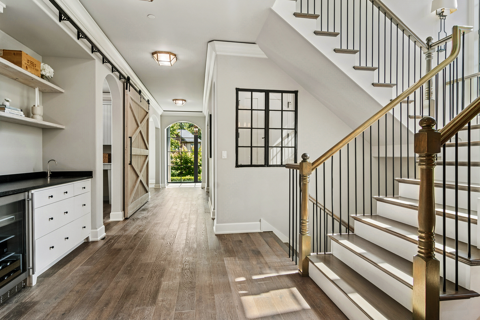 636 South Division Street Barrington, IL 60010 - Photo 14 of 61 a view of an entryway with wooden floor and stairs