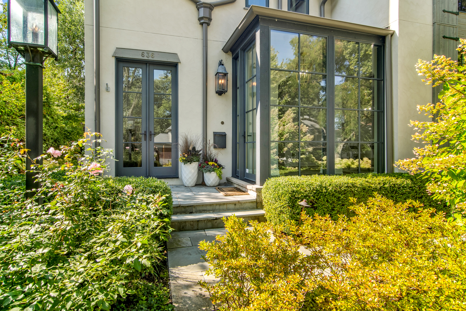 636 South Division Street Barrington, IL 60010 - Photo 2 of 61 a front view of a house with garden