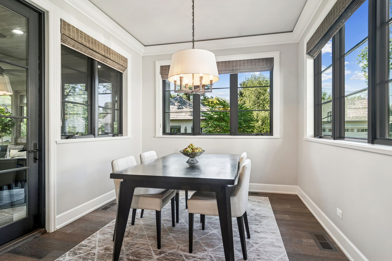 636 South Division Street Barrington, IL 60010 - Photo 23 of 61 a dining room with furniture a chandelier and wooden floor