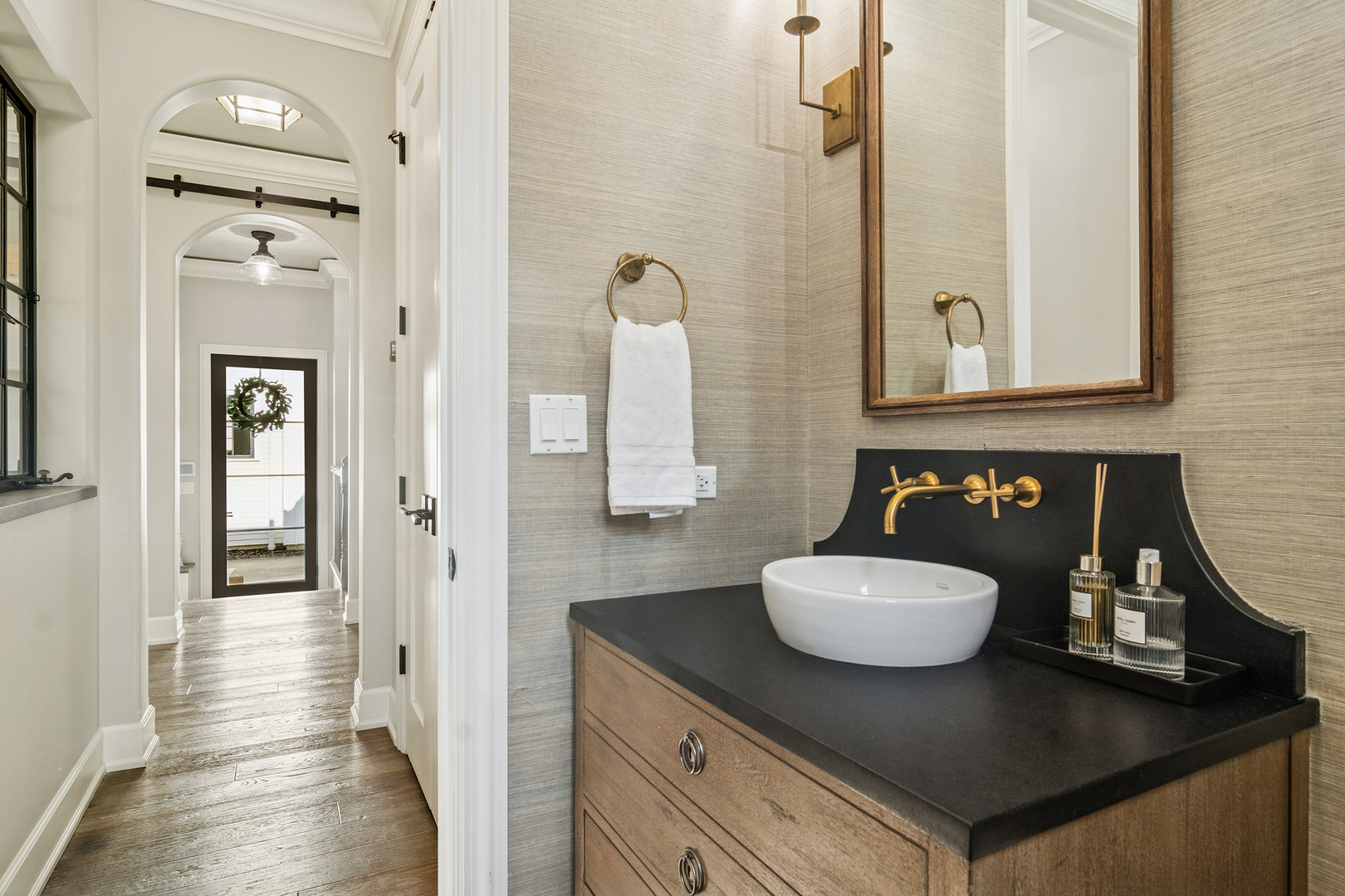 636 South Division Street Barrington, IL 60010 - Photo 29 of 61 a bathroom with a sink and a mirror
