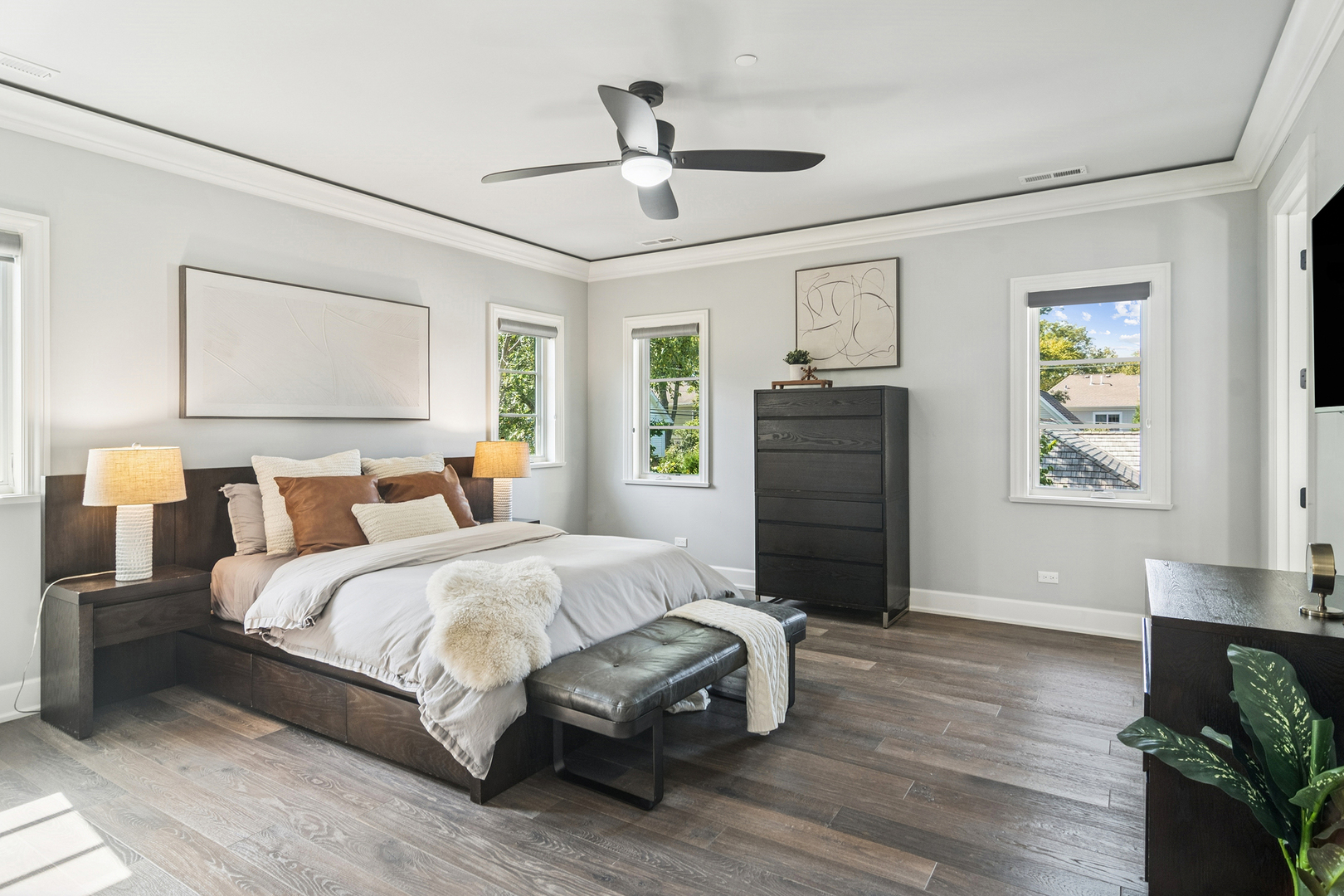 636 South Division Street Barrington, IL 60010 - Photo 33 of 61 a spacious bedroom with a bed and a chandelier