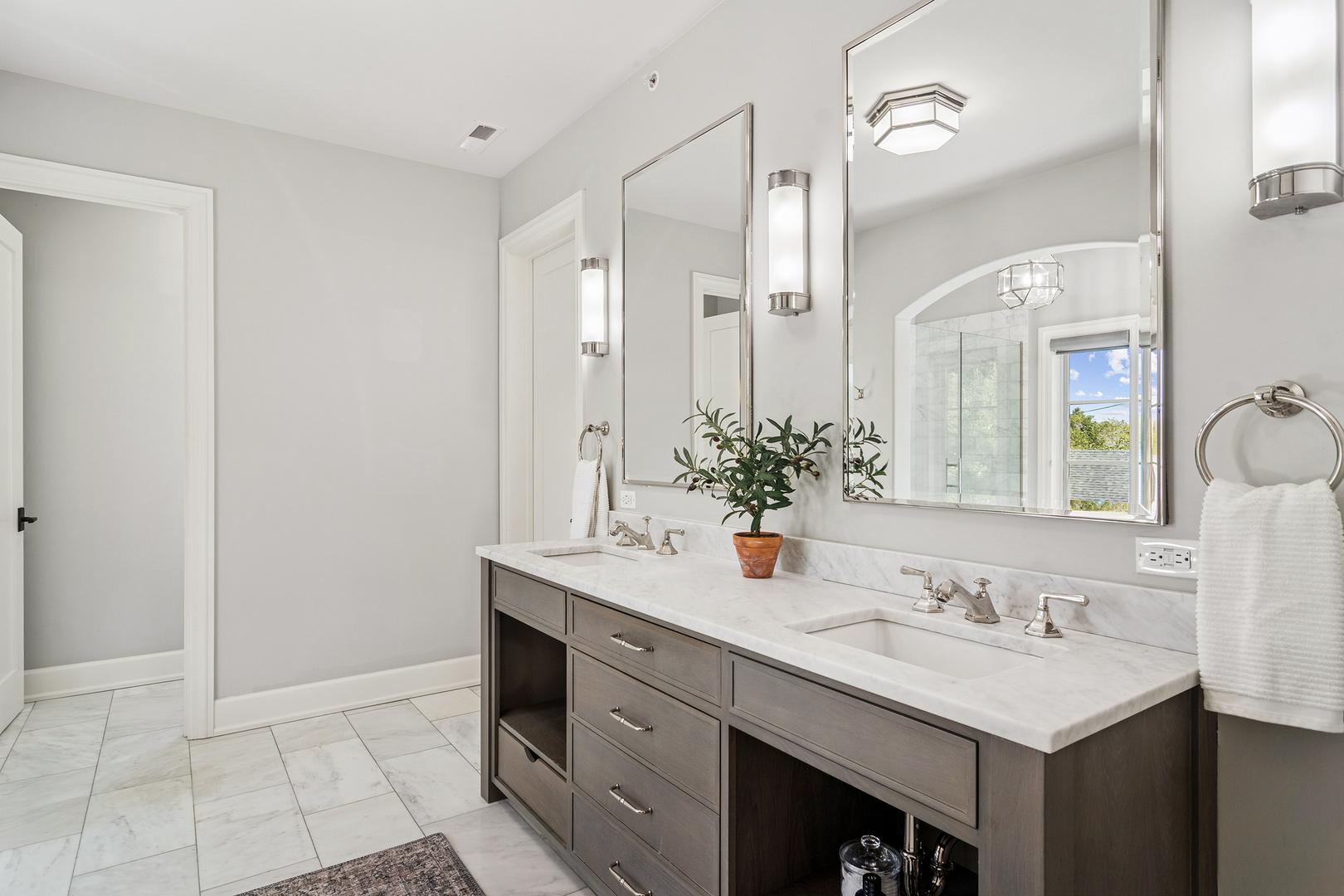 636 South Division Street Barrington, IL 60010 - Photo 36 of 61 a bathroom with a sink and a mirror