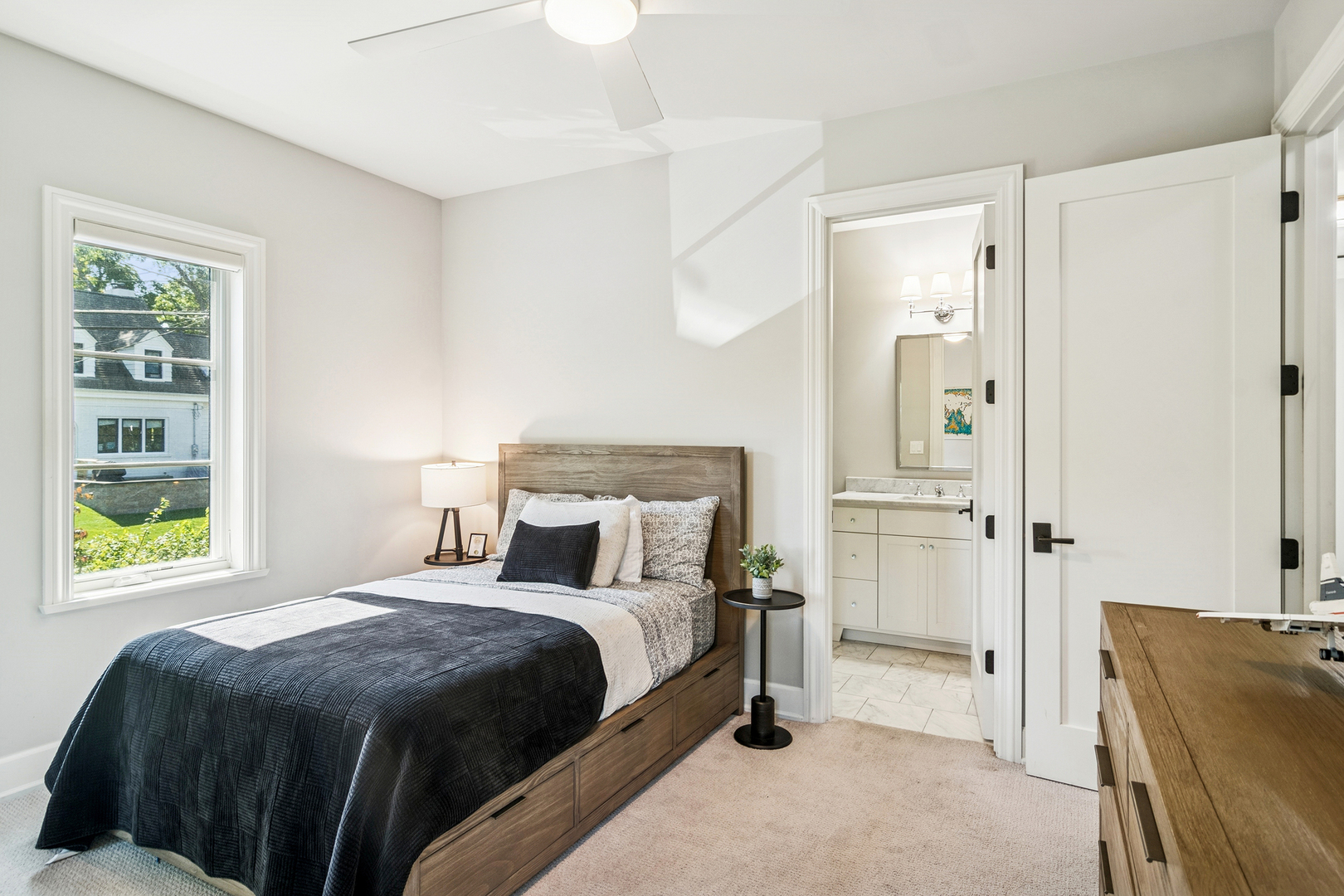 636 South Division Street Barrington, IL 60010 - Photo 37 of 61 a spacious bedroom with a bed and a window