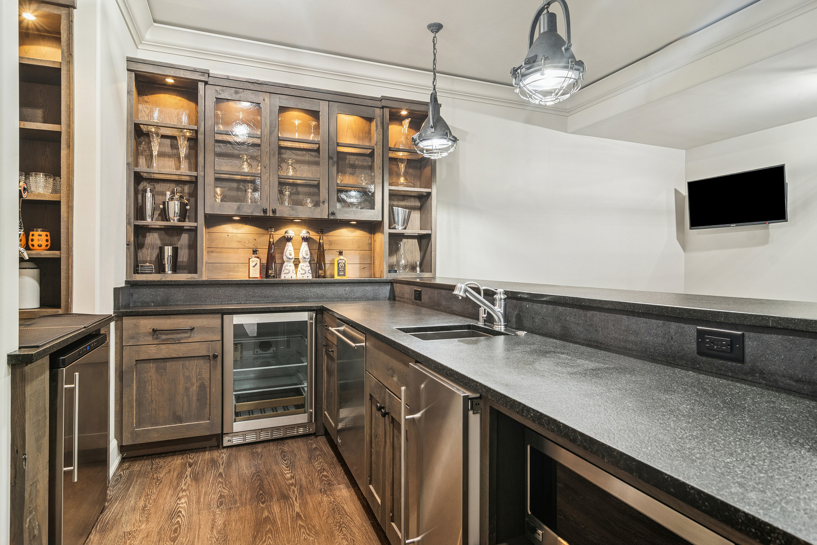 636 South Division Street Barrington, IL 60010 - Photo 45 of 61 a kitchen with a sink and wooden floor