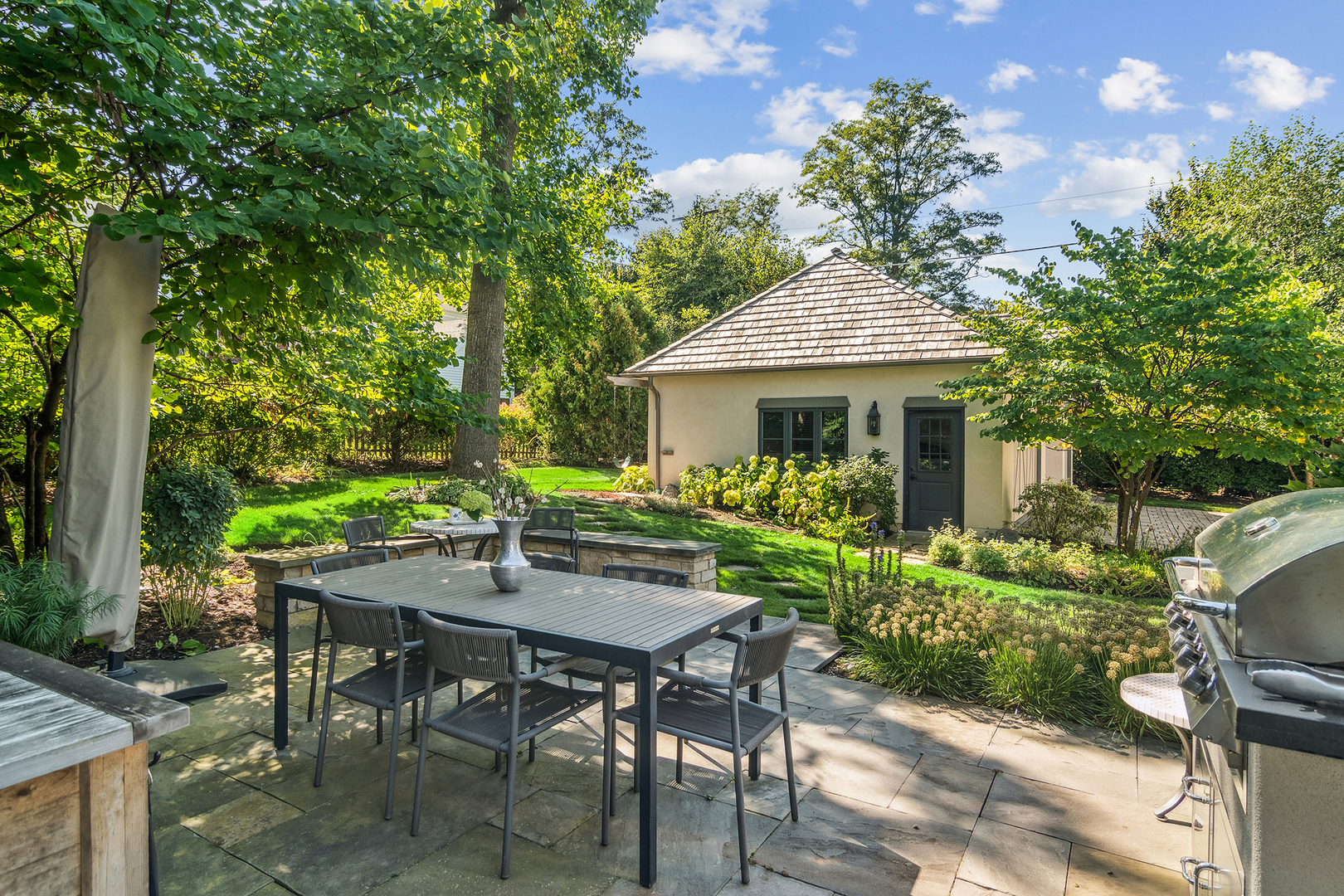 636 South Division Street Barrington, IL 60010 - Photo 53 of 61 a view of an house with backyard and sitting area