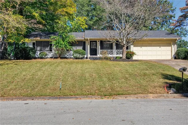 front view of a house with a yard