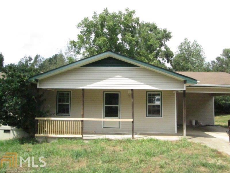 2489 Mud Creek Road, Unit 9 Alto, GA 30510 - Photo 1 of 1 a house with trees in the background