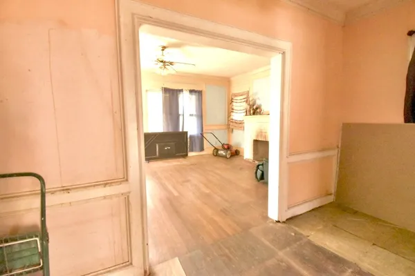 a view of a living room with a tub