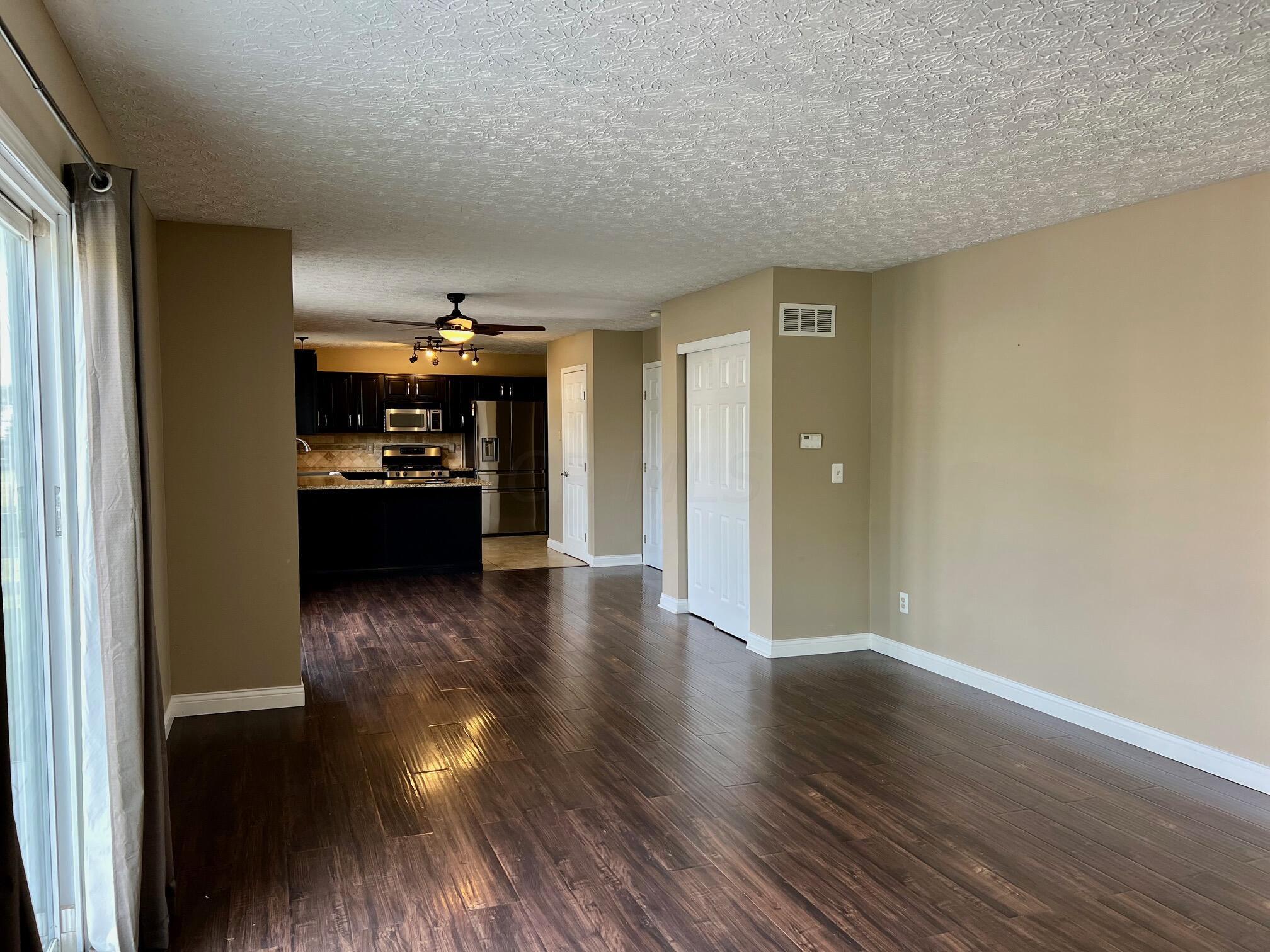 142 Harvard Loop Delaware, OH 43015 - Photo 11 of 37 Family Room Into Kitchen