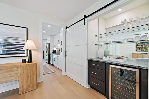 a kitchen with a stove and a table