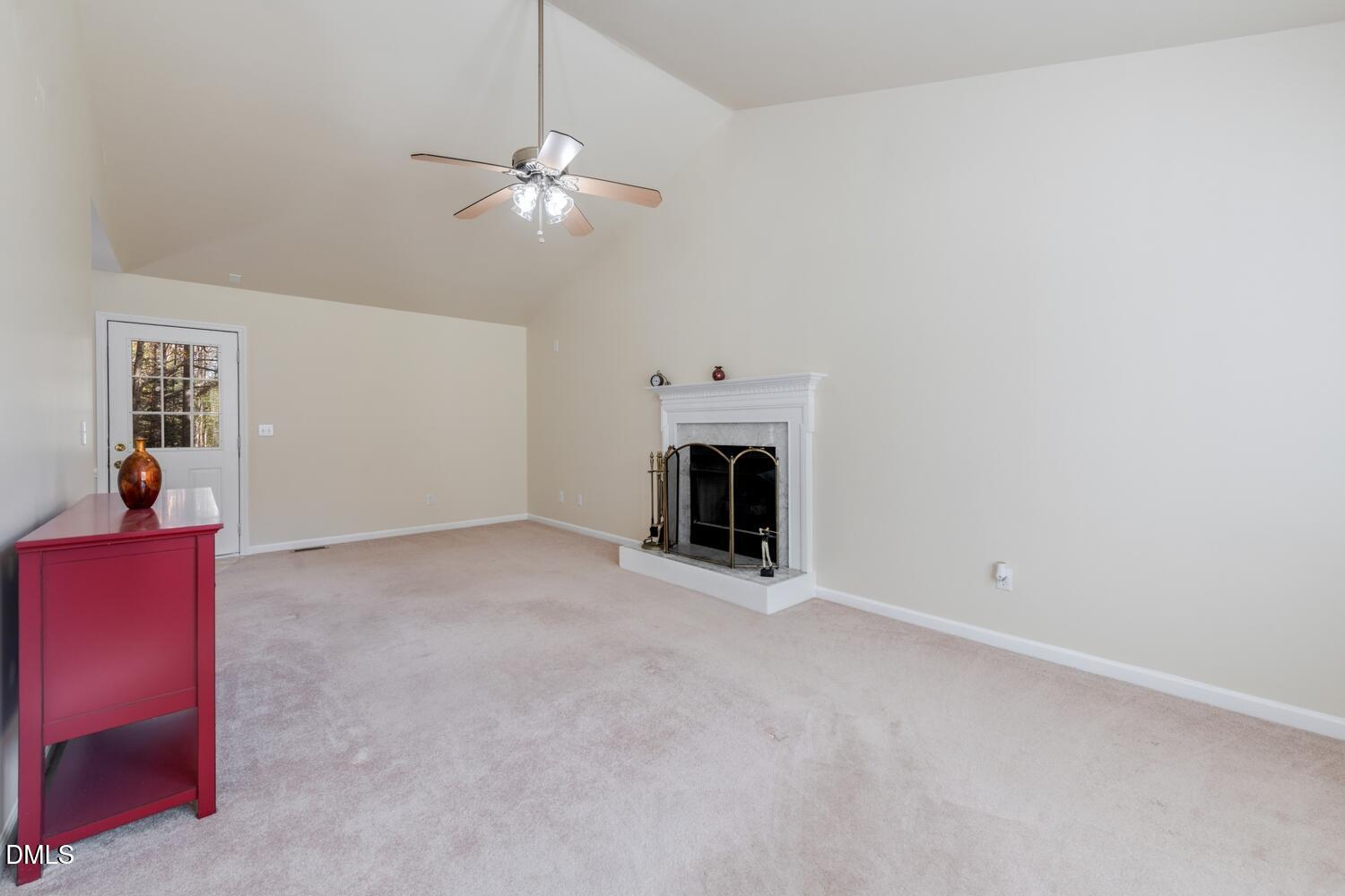 136 Pebblestone Court Willow Spring, NC 27592 - Photo 11 of 24 a view of empty room with fireplace