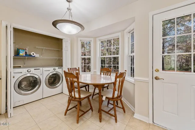 a view of empty room with fireplace