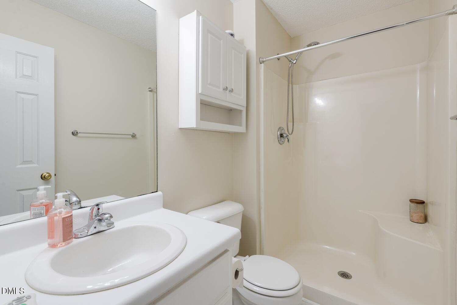 136 Pebblestone Court Willow Spring, NC 27592 - Photo 20 of 24 a bathroom with a sink toilet and shower