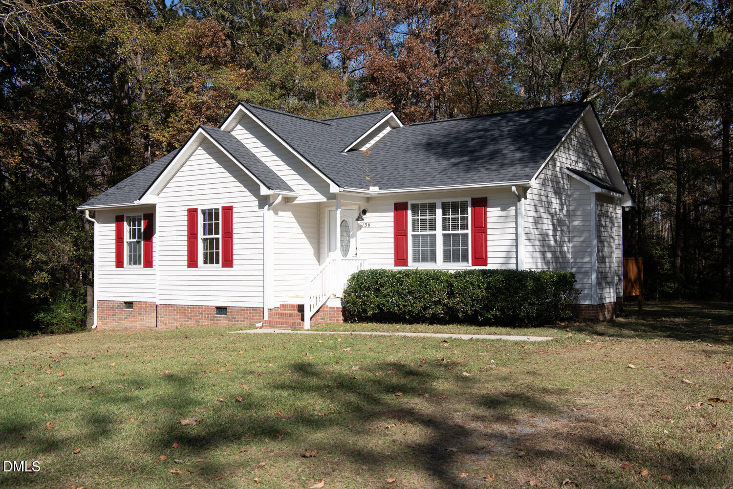 136 Pebblestone Court Willow Spring, NC 27592 - Photo 2 of 24 a front view of a house with a yard