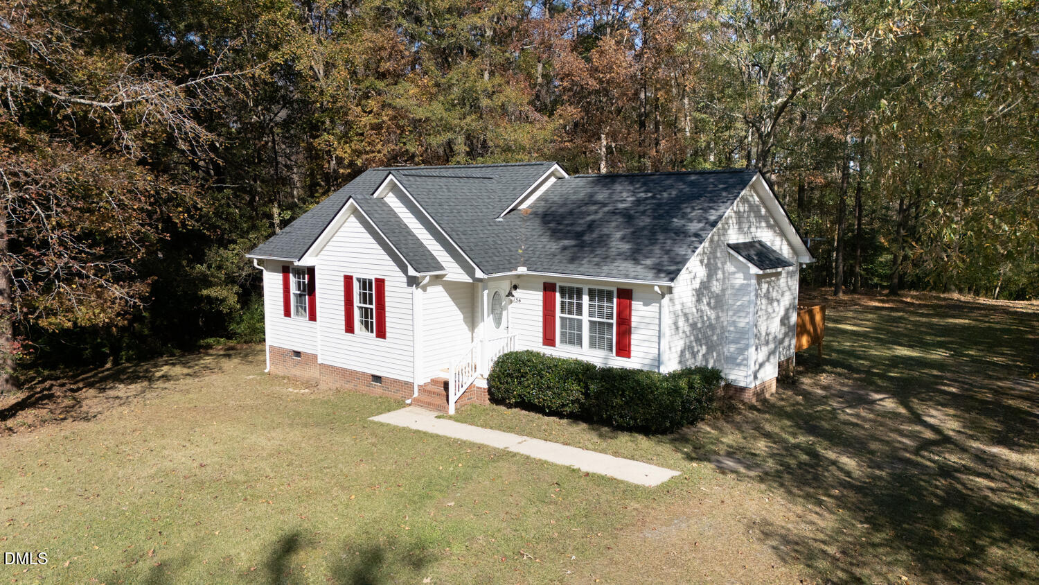 136 Pebblestone Court Willow Spring, NC 27592 - Photo 3 of 24 a front view of a house with a yard
