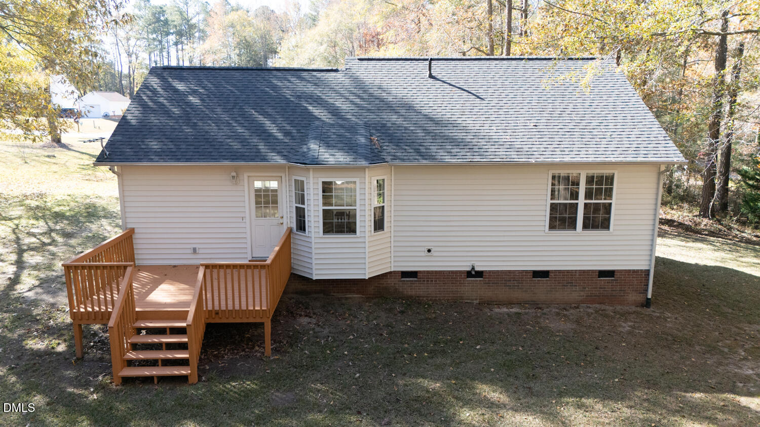 136 Pebblestone Court Willow Spring, NC 27592 - Photo 4 of 24 a view of a house with a yard and sitting area
