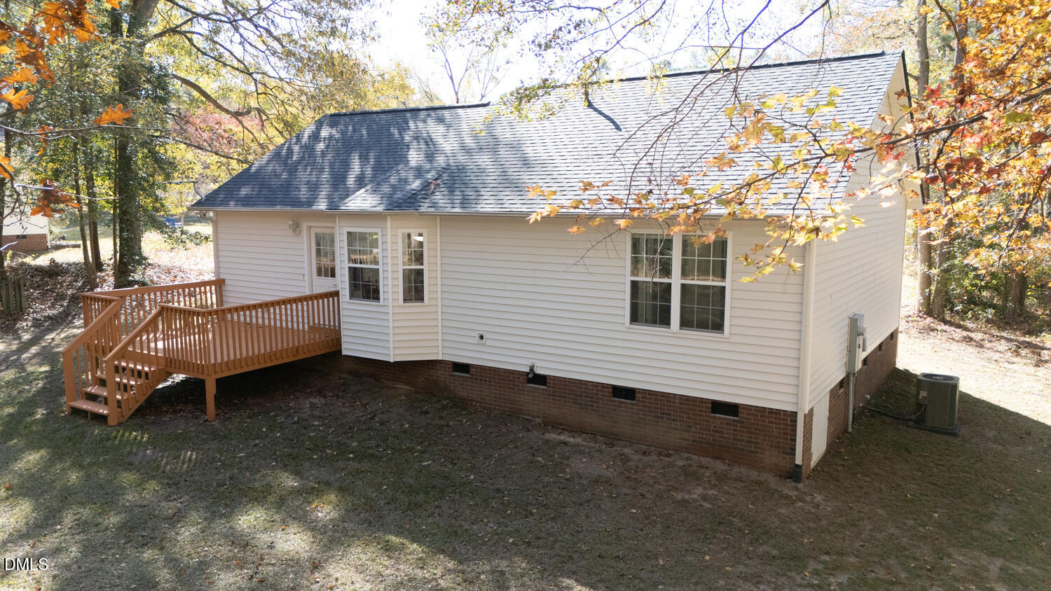 136 Pebblestone Court Willow Spring, NC 27592 - Photo 6 of 24 a view of a house with a yard and wooden fence