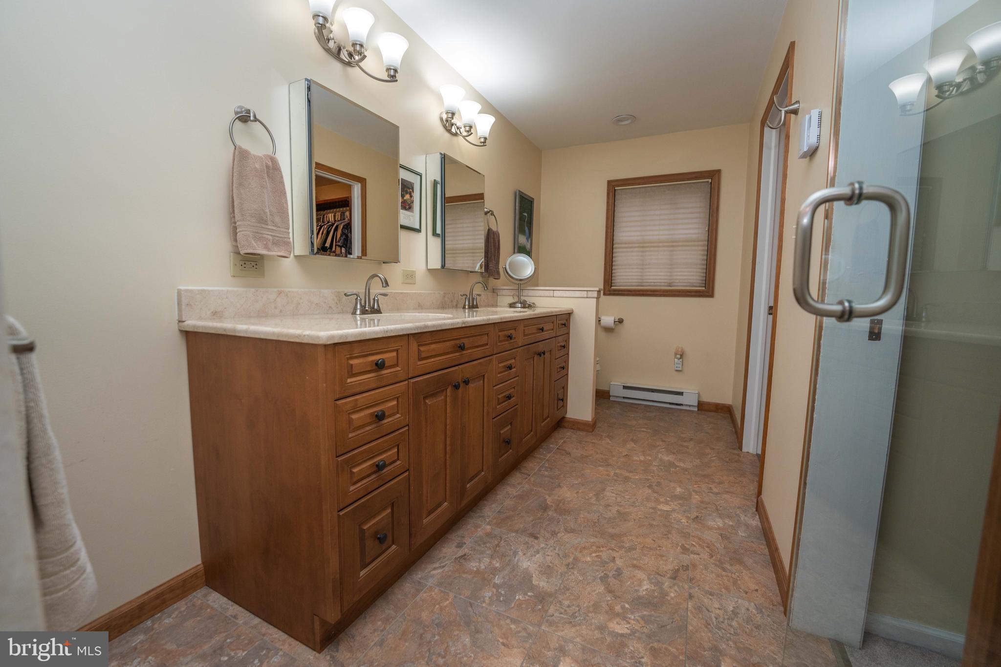 896 Eichele Road Perkiomenville, PA 18074 - Photo 33 of 57 PRIMARY BATH WITH DOUBLE VANITY & TILE FLOOR