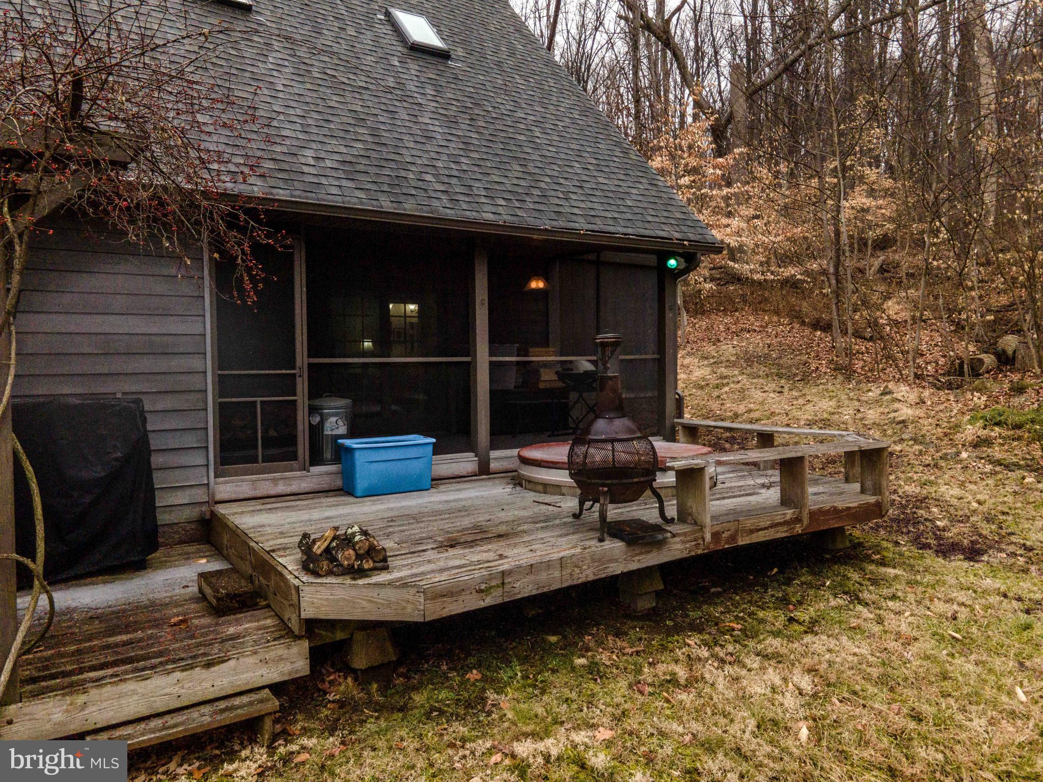 896 Eichele Road Perkiomenville, PA 18074 - Photo 5 of 57 Screened Porch from Primary BDR w/Exterior Deck