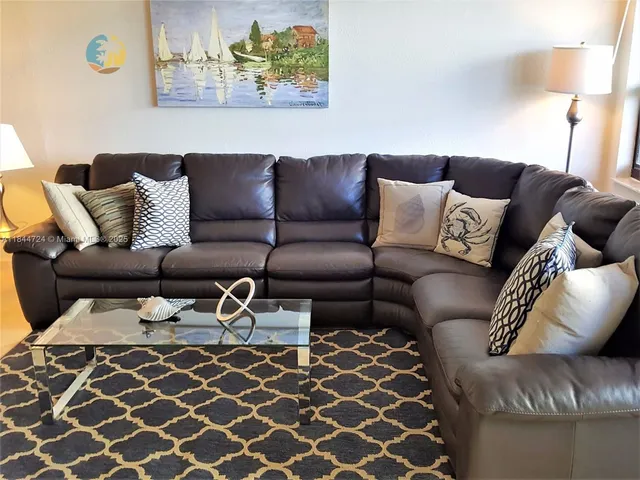 a living room with furniture and a couch