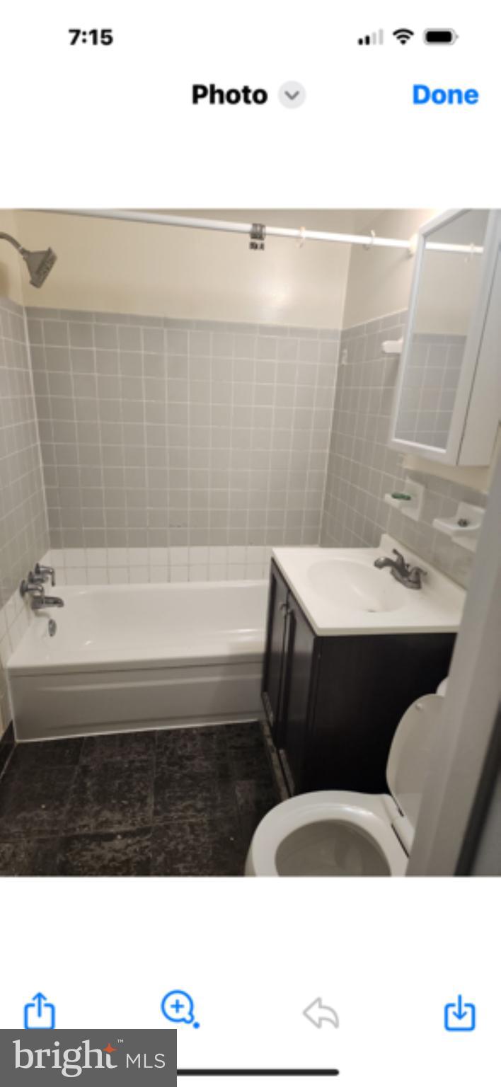 11316 Cherry Hill Road, Unit 203 Beltsville, MD 20705 - Photo 12 of 16 a bathroom with a sink and a mirror