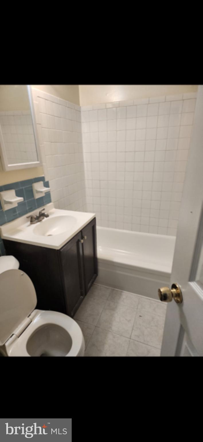 11316 Cherry Hill Road, Unit 203 Beltsville, MD 20705 - Photo 13 of 16 a bathroom with a sink and a mirror