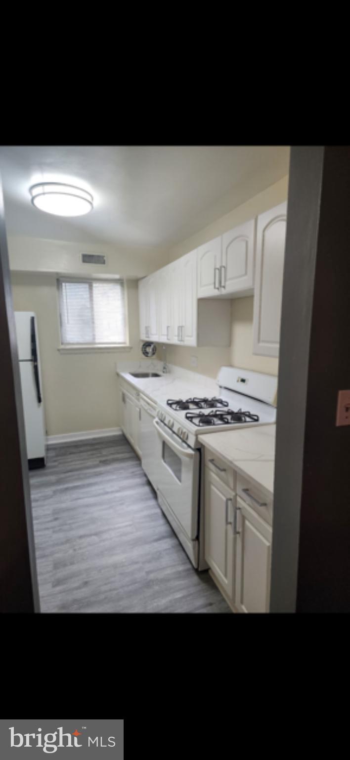 11316 Cherry Hill Road, Unit 203 Beltsville, MD 20705 - Photo 14 of 16 a view of kitchen with granite countertop stainless steel appliances