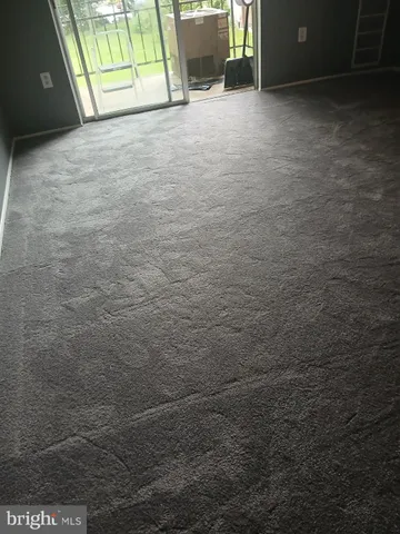 a view of a room with a door