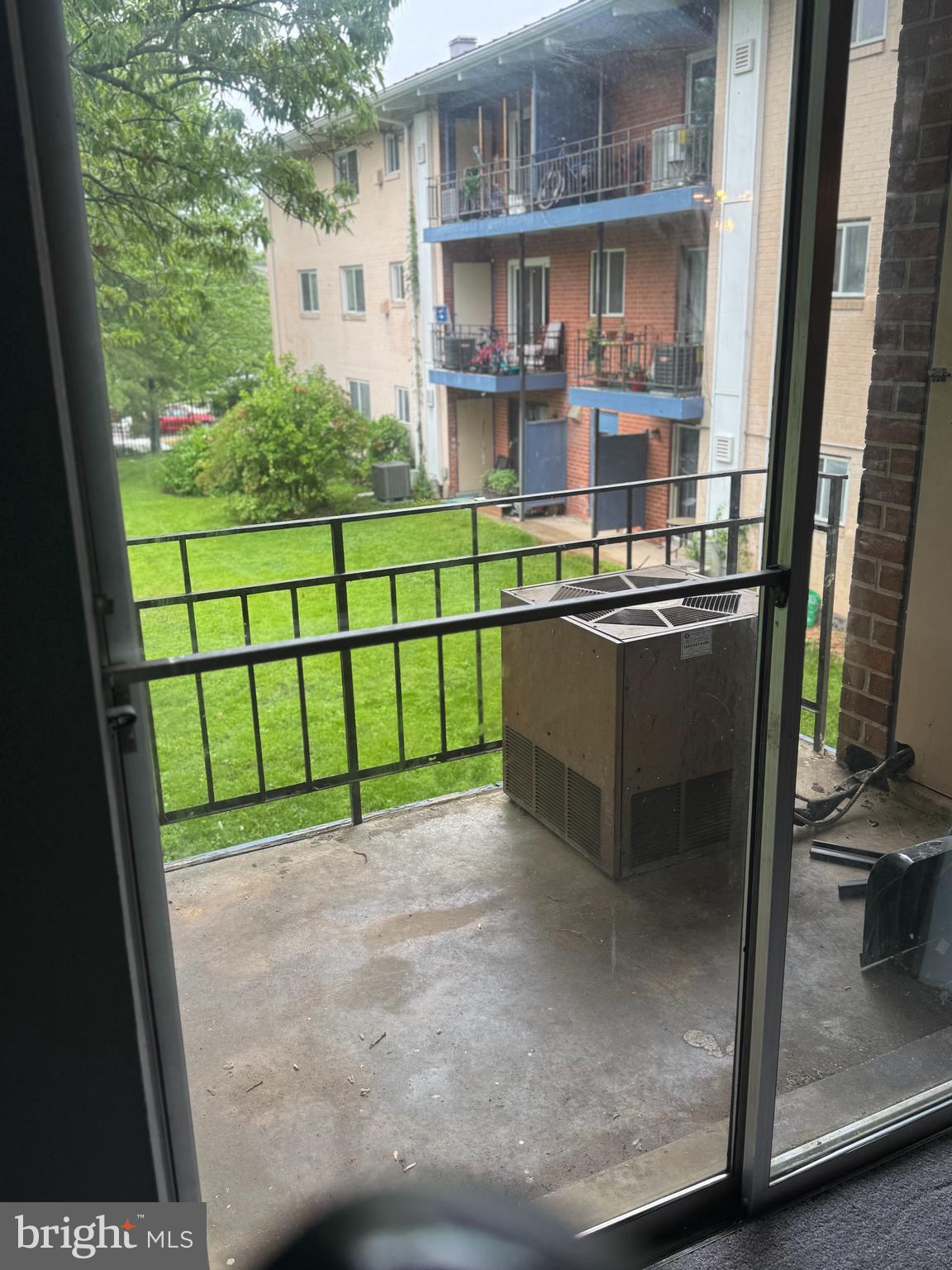 11316 Cherry Hill Road, Unit 203 Beltsville, MD 20705 - Photo 8 of 16 a view of a street with a building in the background