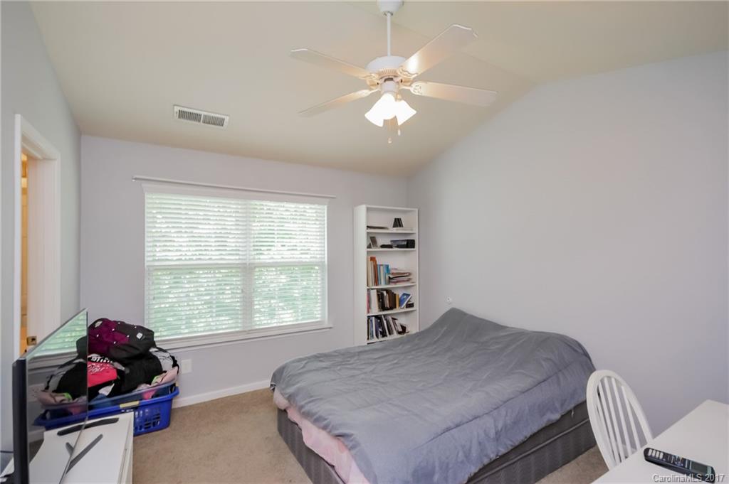 150 Limerick Road, Unit C Mooresville, NC 28115 - Photo 14 of 17 a bedroom with a bed and a window