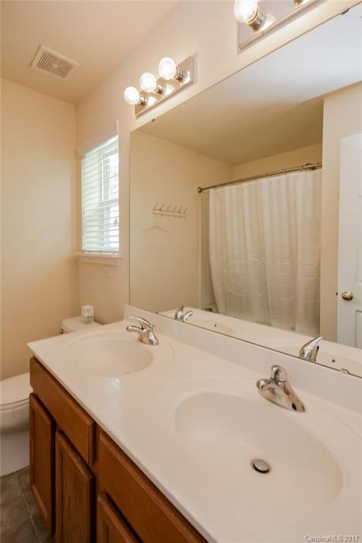 150 Limerick Road, Unit C Mooresville, NC 28115 - Photo 15 of 17 a bathroom with a sink and a bathtub
