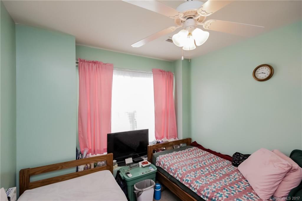 150 Limerick Road, Unit C Mooresville, NC 28115 - Photo 16 of 17 a bedroom with a bed and a window