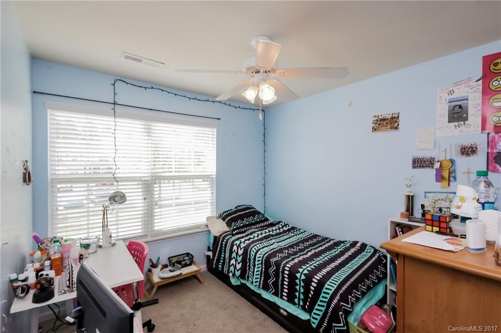 150 Limerick Road, Unit C Mooresville, NC 28115 - Photo 17 of 17 a bedroom with bed and a window